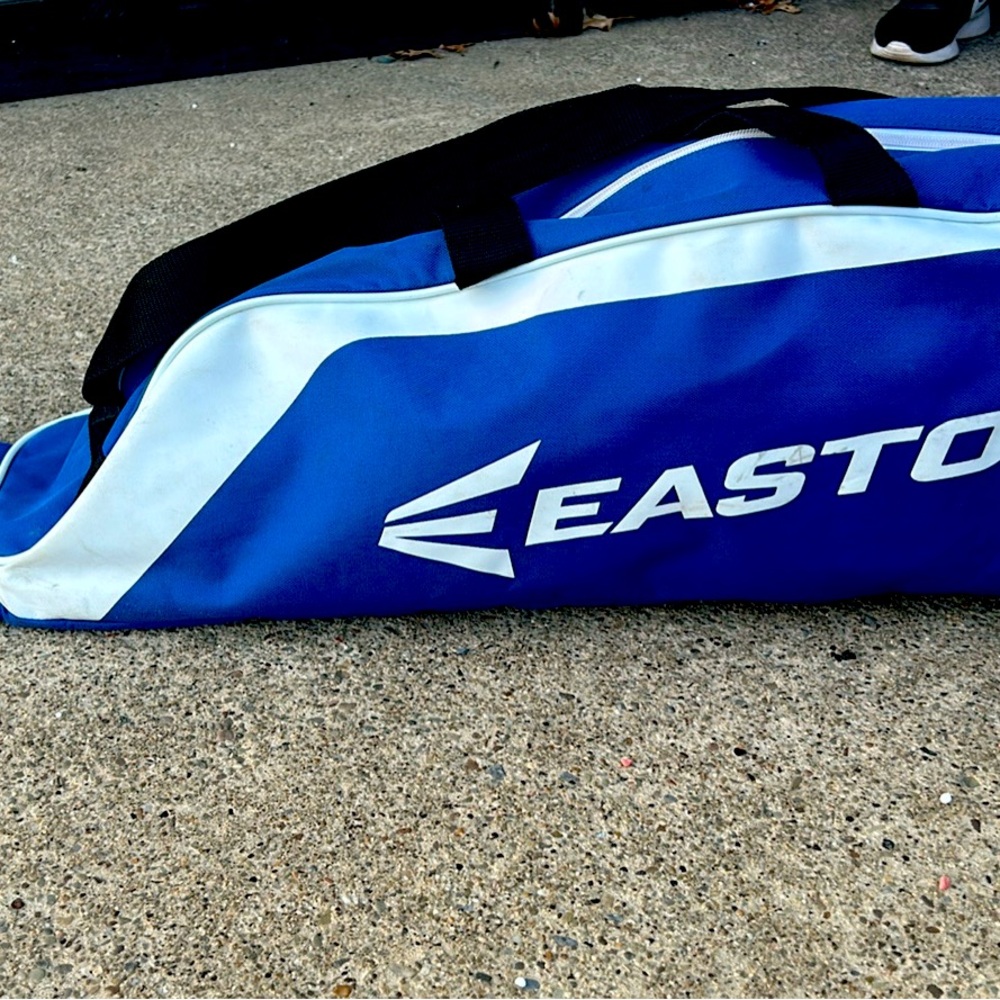 Easton baseball bag baseball gloves and a bat